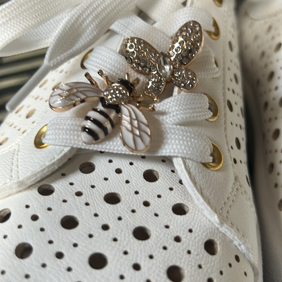 Elegant White Dolce Vita  Perforated Sneakers with Gold Accents - Picture 1 of 4